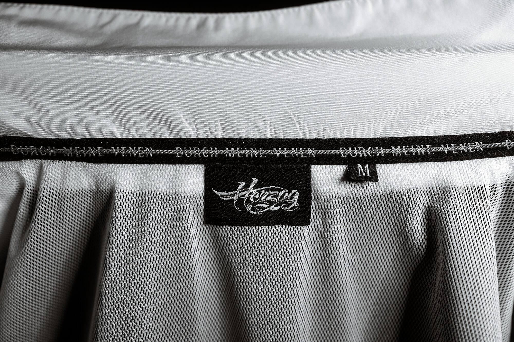 7-DMV_Windbreaker_Nackenband-Detail